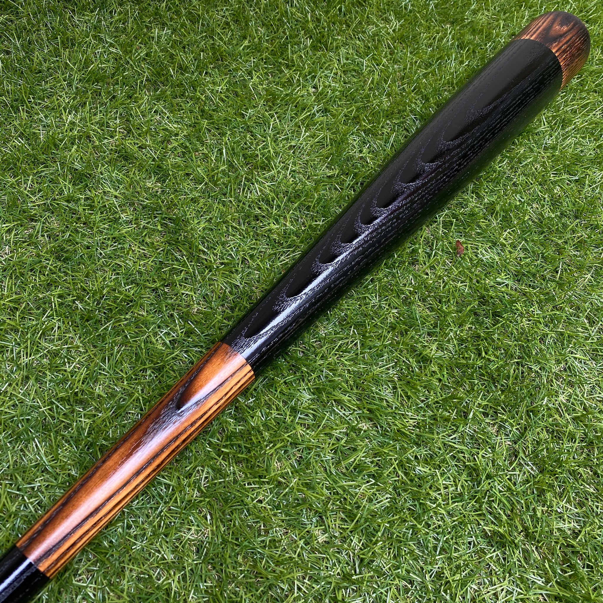 Black flame charred Mitchell bat (no stripes)